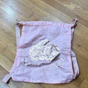 Pink Drawstring Backpack with Gold Carriage Graphic